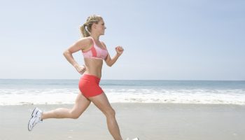Women running near beach