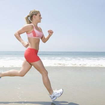Women running near beach