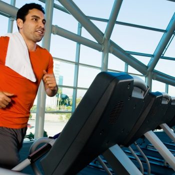 A guy running in a treadmill