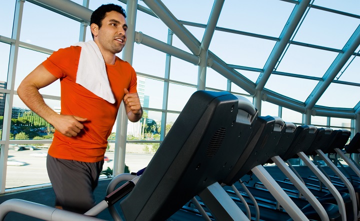 A guy running in a treadmill